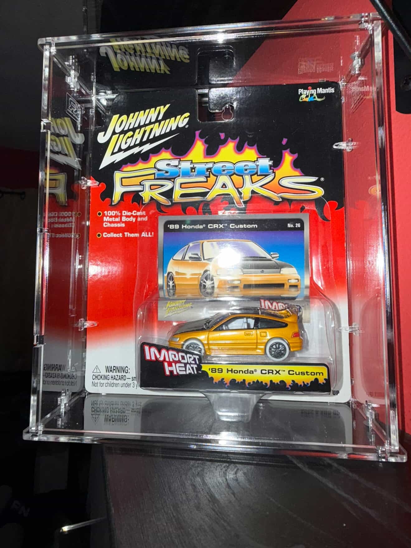 Expositor acrílico fundido a presión de Johnny Lightning (tarjeta ancha)