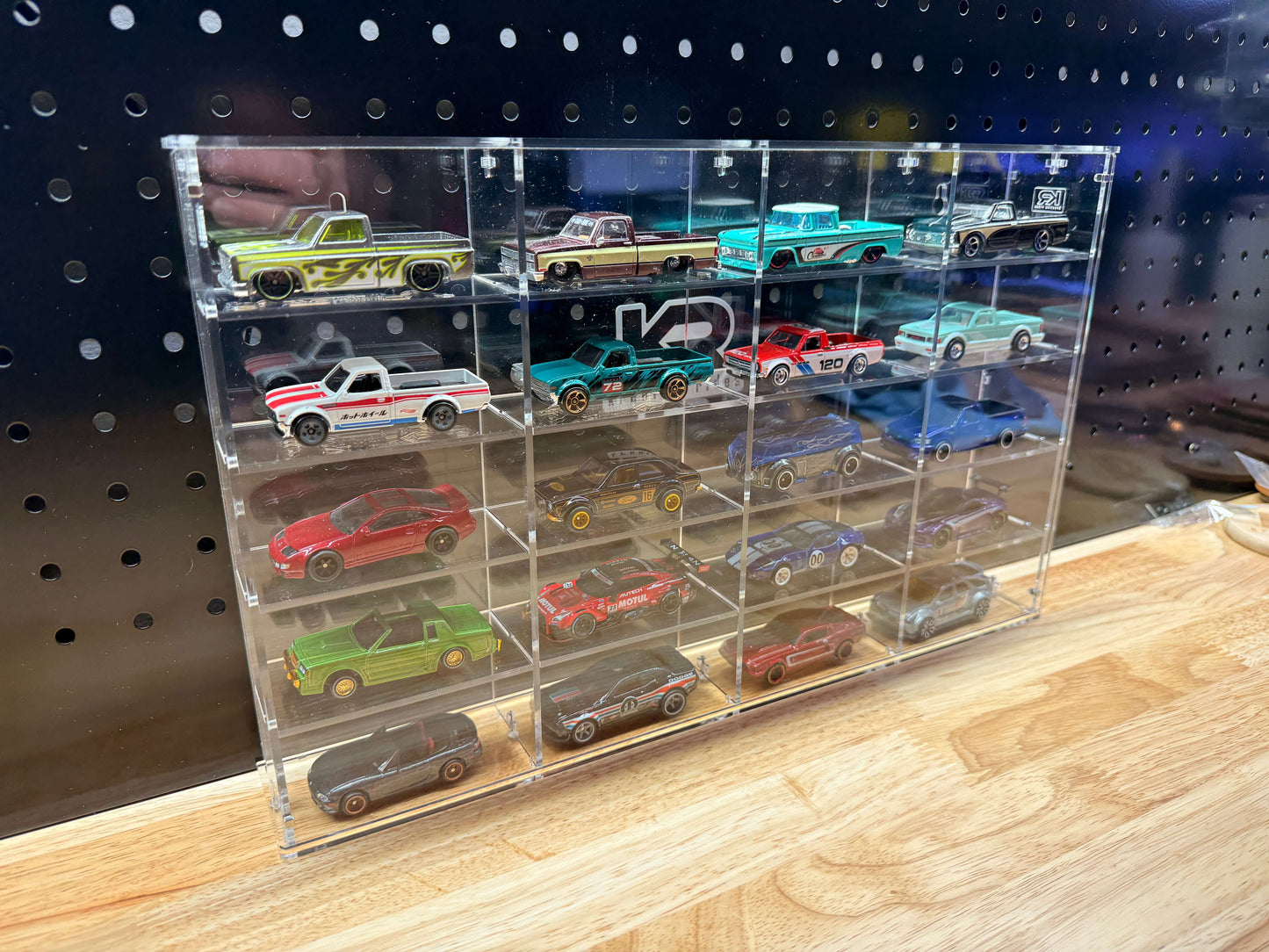 THE TWENTY PACK - Acrylic display case with a clear background that holds up to 20 individual 1:64 scale model vehicles