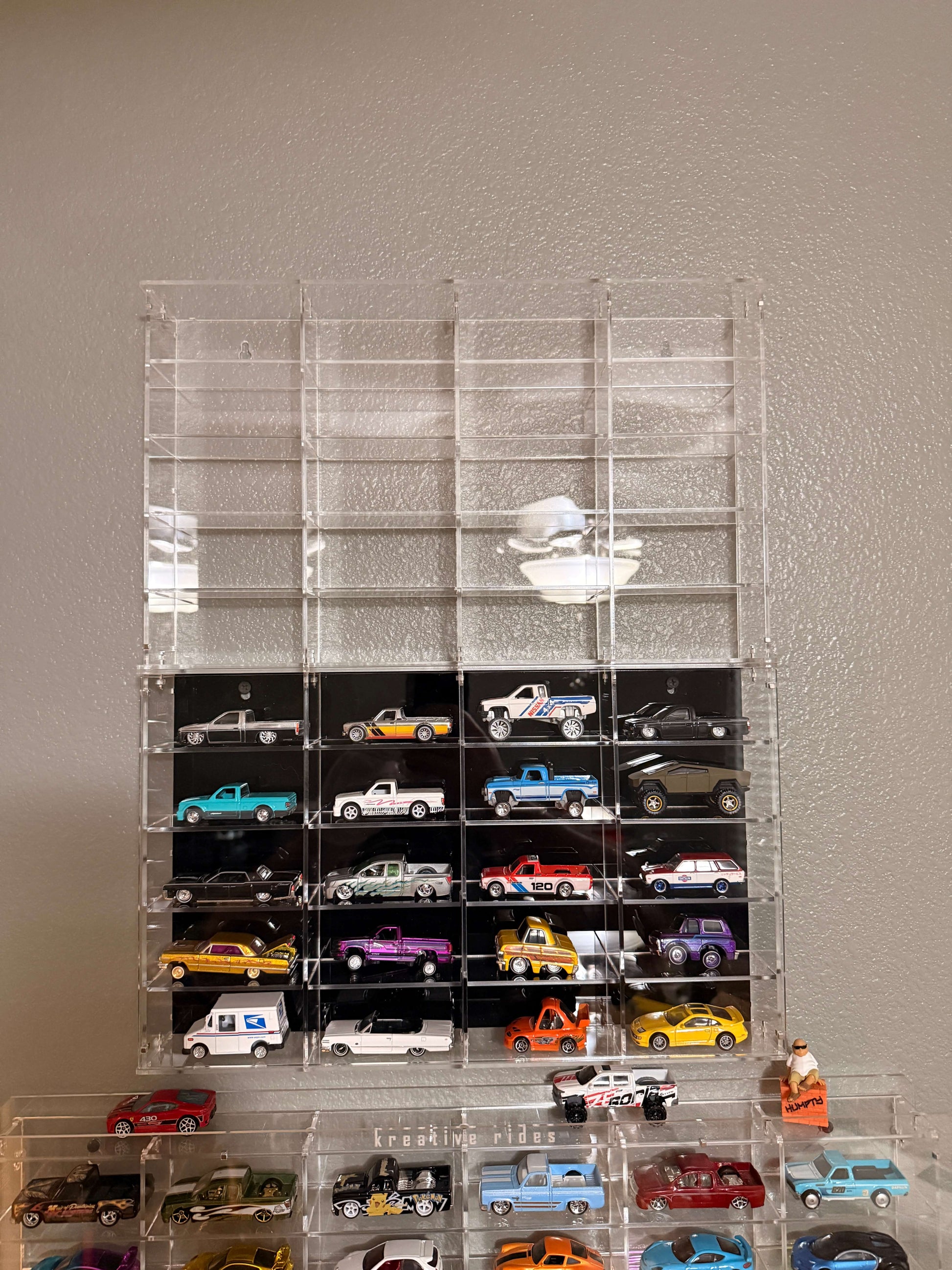 THE TWENTY PACK - Acrylic display case with a clear or black background that holds up to 20 individual 1:64 scale model vehicles
