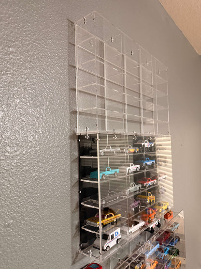 THE TWENTY PACK - Acrylic display case with a clear or black background that holds up to 20 individual 1:64 scale model vehicles