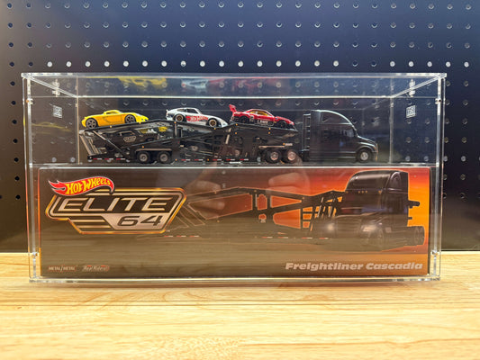 Hot Wheels Elite 64 Freightliner Cascadia in an acrylic display case